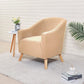 Housse beige installée sur fauteuil, vue de côté