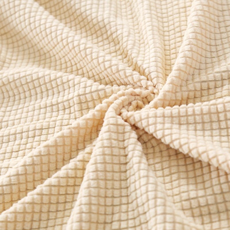 Housse beige sur fauteuil cabriolet, tissu imperméable visible
