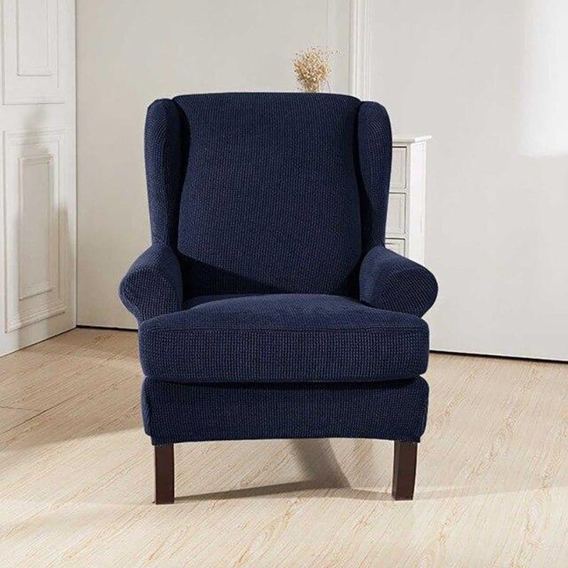 Housse bleue sur fauteuil à oreilles, tissu jacquard extensible