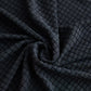 Vue rapprochée de la texture imperméable de la housse