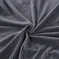 Housse grise imperméable sur fauteuil cabriolet, vue de face