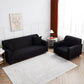 Détail du tissu polyester extensible noir sur accoudoir