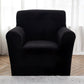 Housse noire couvrant entièrement un fauteuil