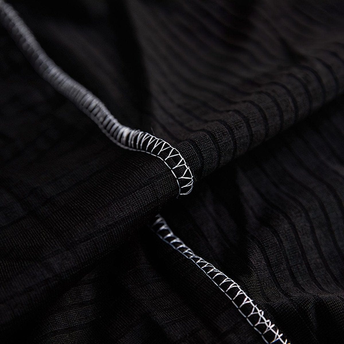 Housse imperméable avec attaches et tiges en mousse