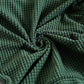 Housse verte imperméable sur fauteuil cabriolet, vue de face