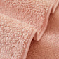 Détail du système antidérapant sous la housse de canapé