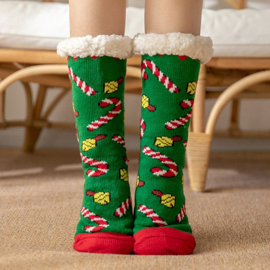 Chaussettes vertes en Pilou Pilou avec motifs de Noël