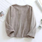 Haut de pyjama gris avec col rond et boutons