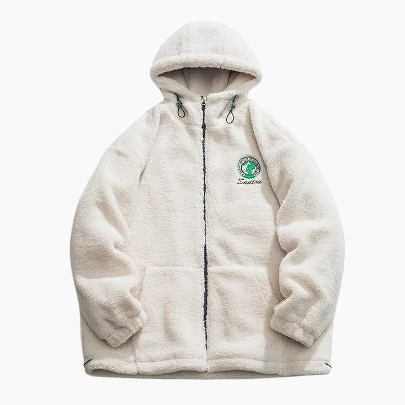 Vue de face d'un manteau blanc en matière moumoute
