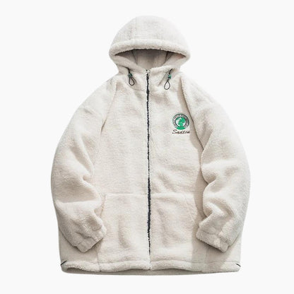 Vue de face d'un manteau blanc en matière moumoute