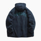 Manteau bleu marine avec col rond et fermeture éclair