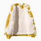Manteau jaune en moumoute avec fermeture éclair visible