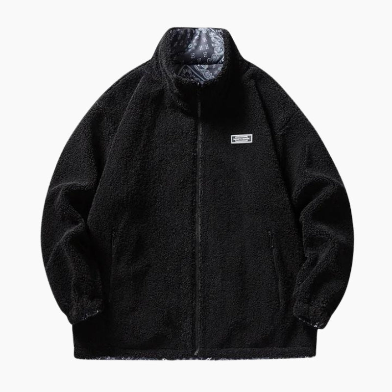 Vue de face d'un manteau noir réversible pour femme