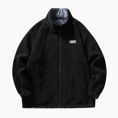 Vue de face d'un manteau noir réversible pour femme
