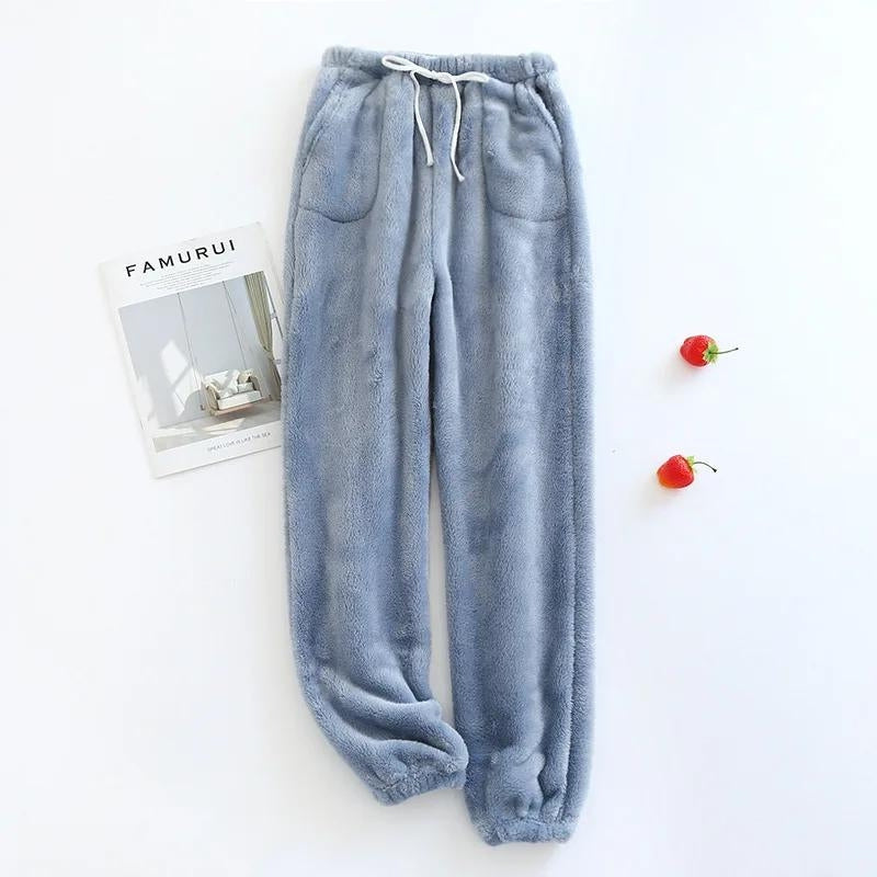 Vue de côté du pantalon pyjama bleu en pilou