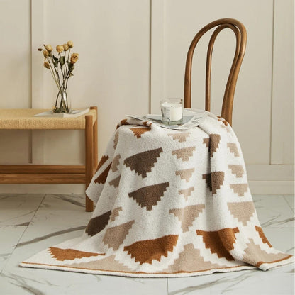 Vue d'ensemble du plaid sur un lit, motifs ethniques