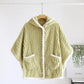 Vue d'ensemble du poncho pyjama vert pour femme