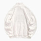 Pull blanc duveteux avec col montant et manches longues