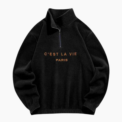 Vue de face d'un pull polaire noir pour femme