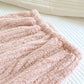 Vue de dos du pyjama rose, mettant en valeur le confort