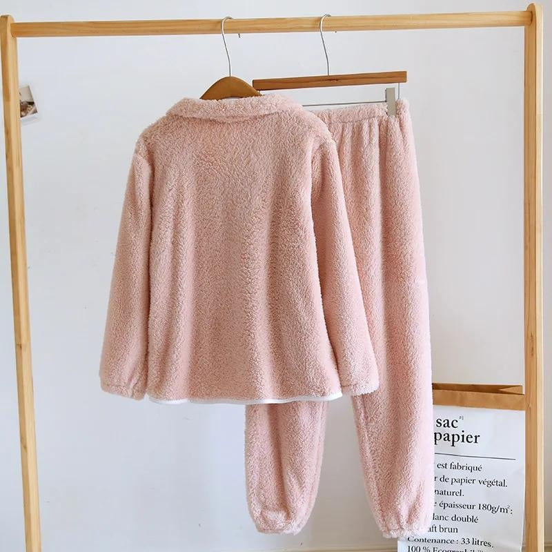 Pyjama polaire rose avec col rabattu et fermeture éclair