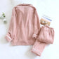 Pyjama polaire rose pour femme avec col rabattu et boutons
