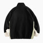 Veste d'intérieur bicolore en peluche avec col rond zippé