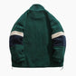 Veste verte en moumoute avec fermeture éclair visible