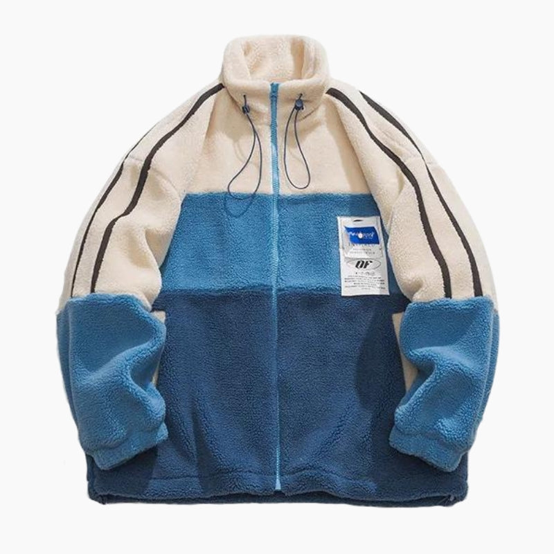 Détail de la veste bleue en matière douce et chaude