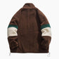 Veste marron en moumoute avec fermeture éclair visible
