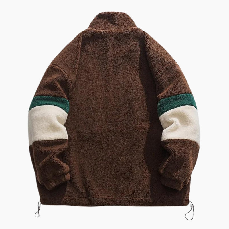 Veste marron en moumoute avec fermeture éclair visible