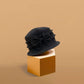 Gros plan sur le bord du chapeau cloche, texture détaillée