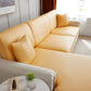 Housse jaune en simili cuir sur coussin de canapé