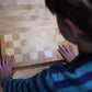 Jeu d'échecs pliable en bois avec pièces rangées