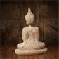 Statuette Bouddha en résine sur fond blanc