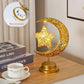 Veilleuse LED en forme de lune et étoile sur fond sombre