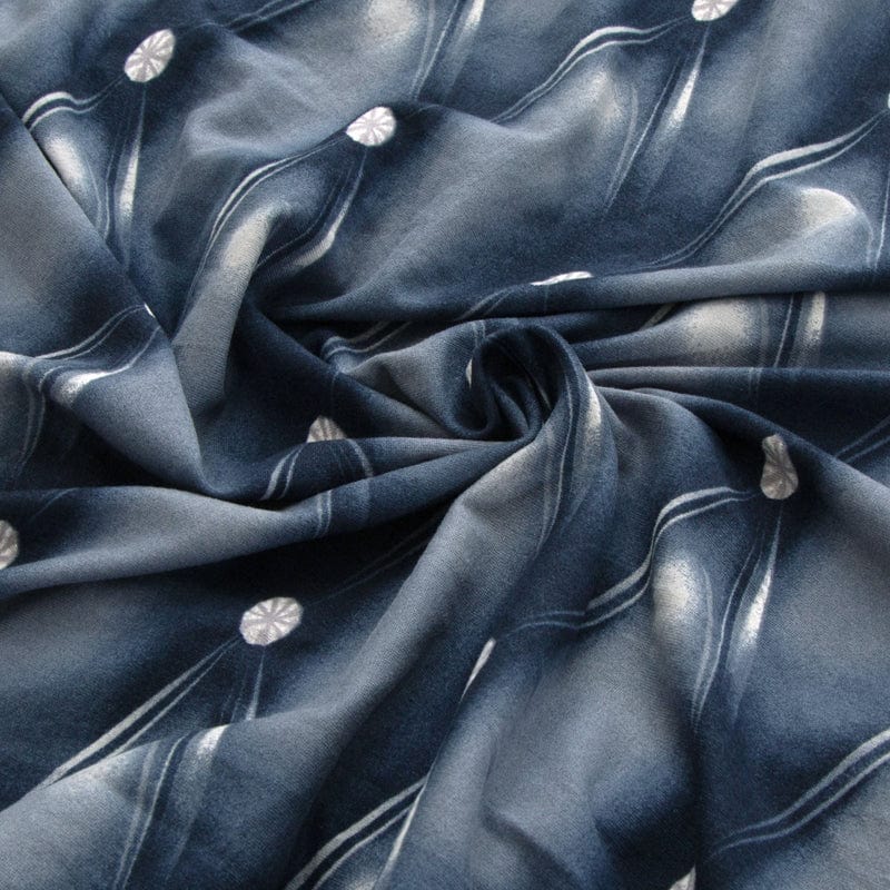 Housse à motifs géométriques sur coussin de salon