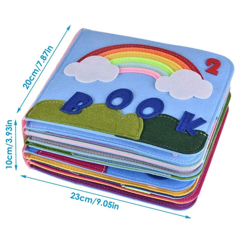 Livre en feutrine ouvert avec pièces colorées amovibles