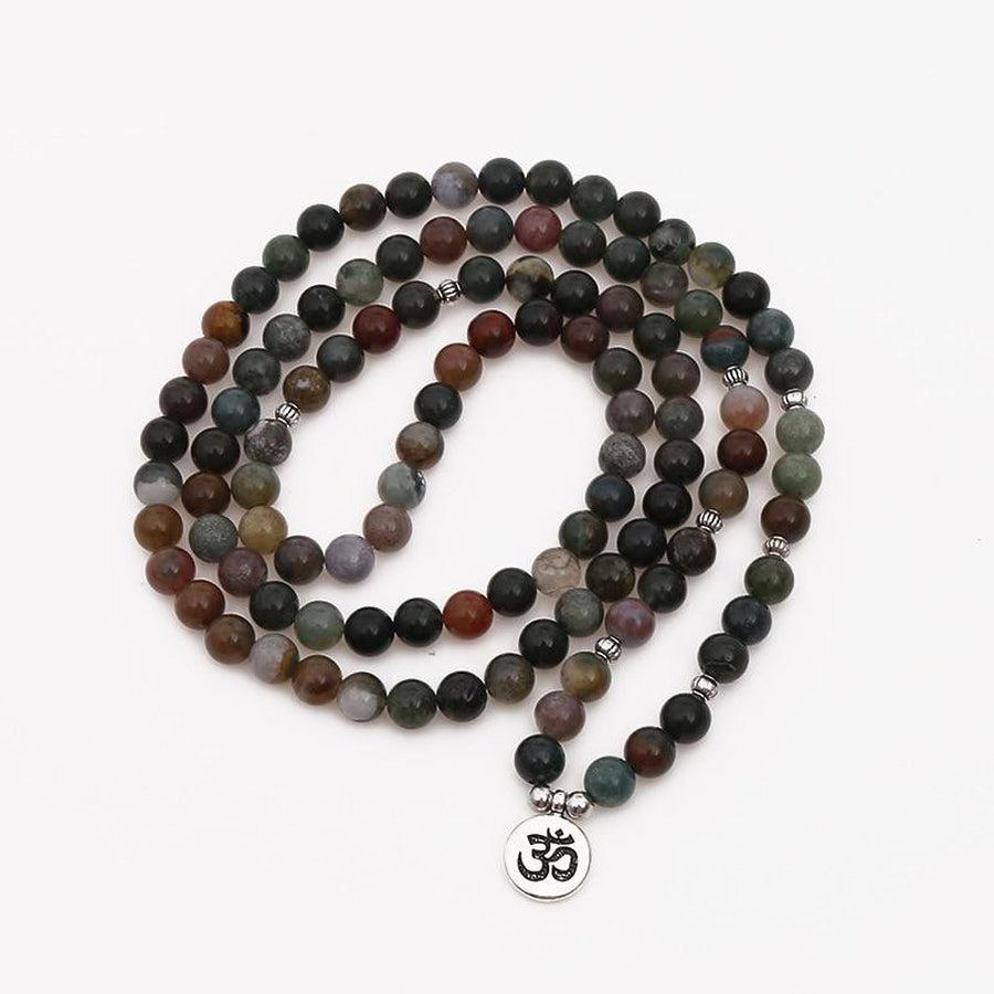 Détail des perles d'Onyx indienne aux teintes variées