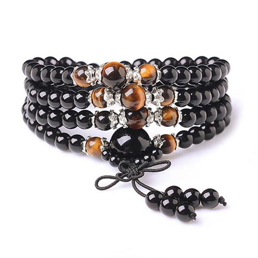 Perles d'Onyx noir, accent sur la texture et la couleur