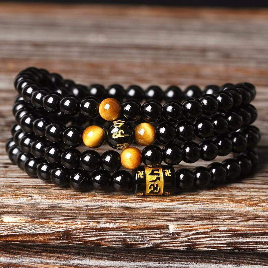 Vue d'ensemble du mala avec perles d'agate et œil de tigre