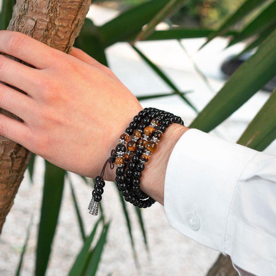 Détail des perles en obsidienne noire du mala
