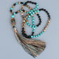 Mala en onyx et turquoise avec pendentif népalais