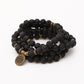 Mala en pierres de lave avec 108 perles noires