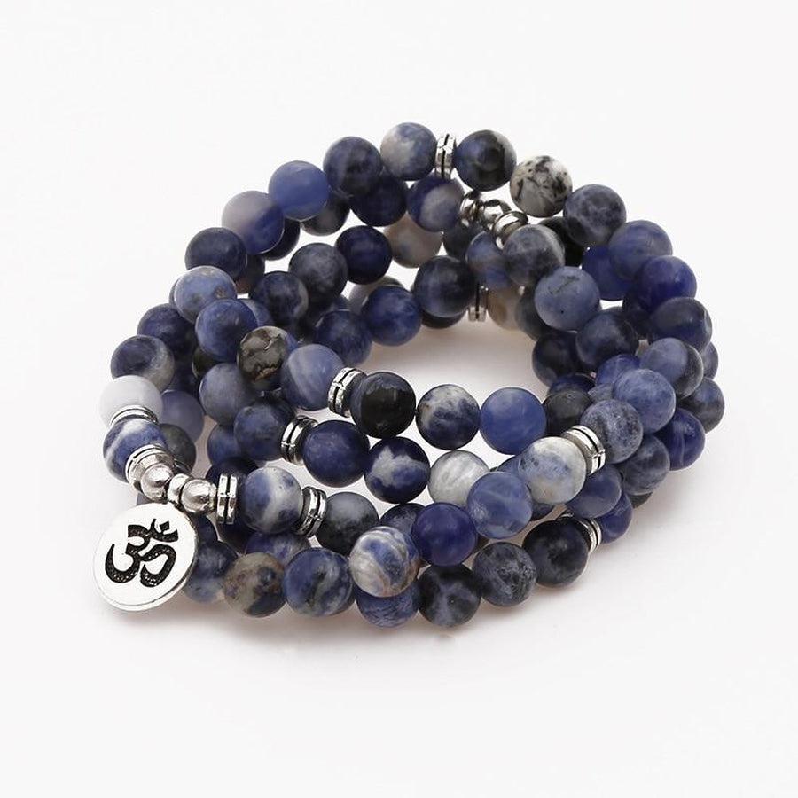 Détail des perles bleues du mala méditation