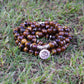 Mala en Œil de Tigre avec 108 perles, vue rapprochée