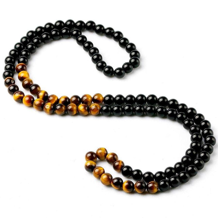Mala en Onyx et Œil de tigre sur fond blanc