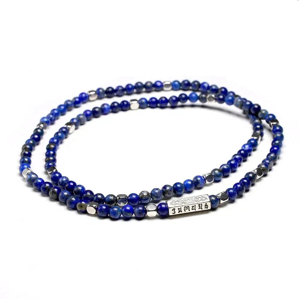 Détail des perles de 4 mm du mala tibétain
