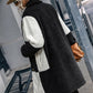 Texture douce du manteau en molleton noir et blanc