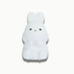 Gros plan sur la veilleuse lapin allumée, couleurs variées